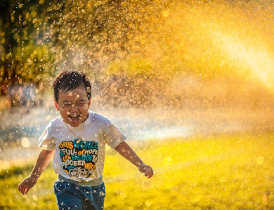 Smiling child with burden free mind playing happily